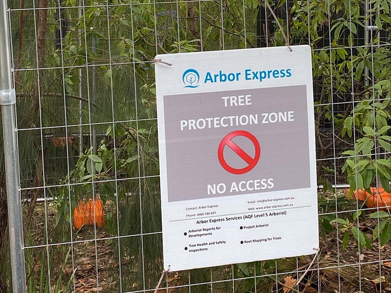 tree protection zone sign on fence