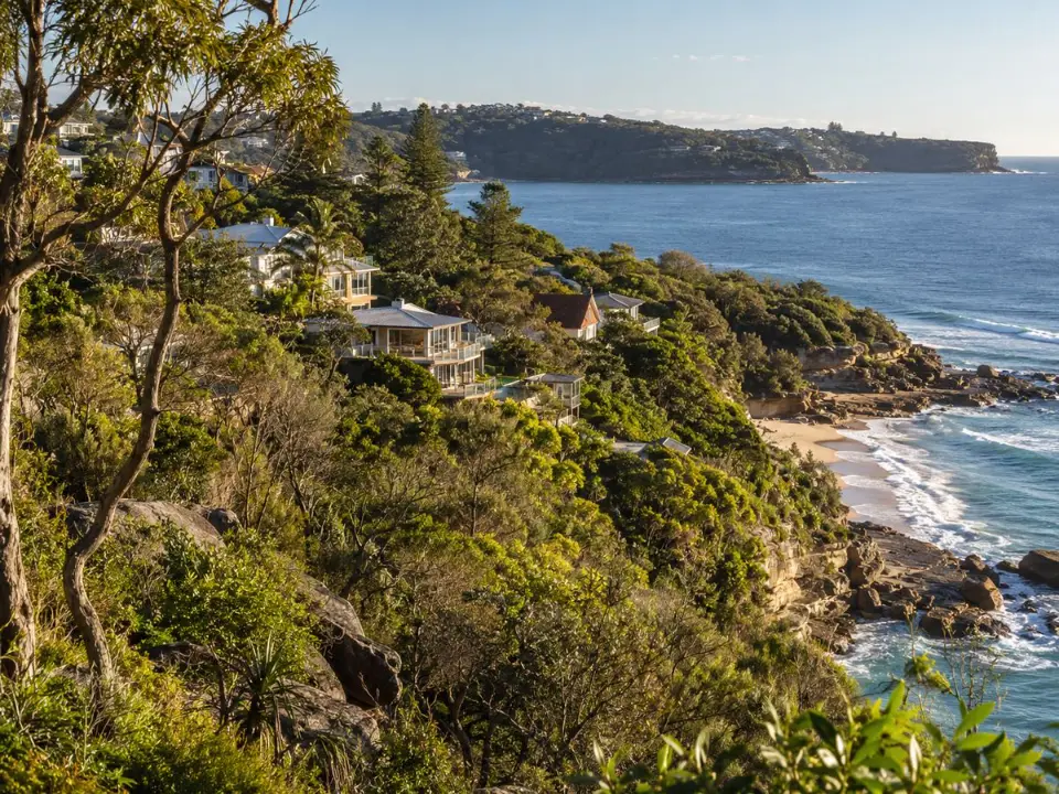 Coastal homes beside bushland on the Northern Beaches
