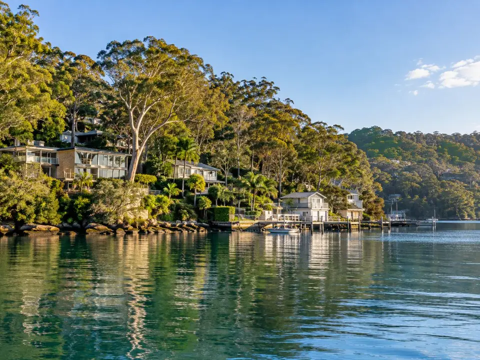 Waterfront homes beside bushland on Pittwater