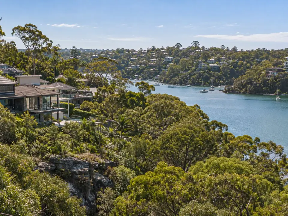 Homes on bushland-fringed slopes above Middle Harbour in Willoughby